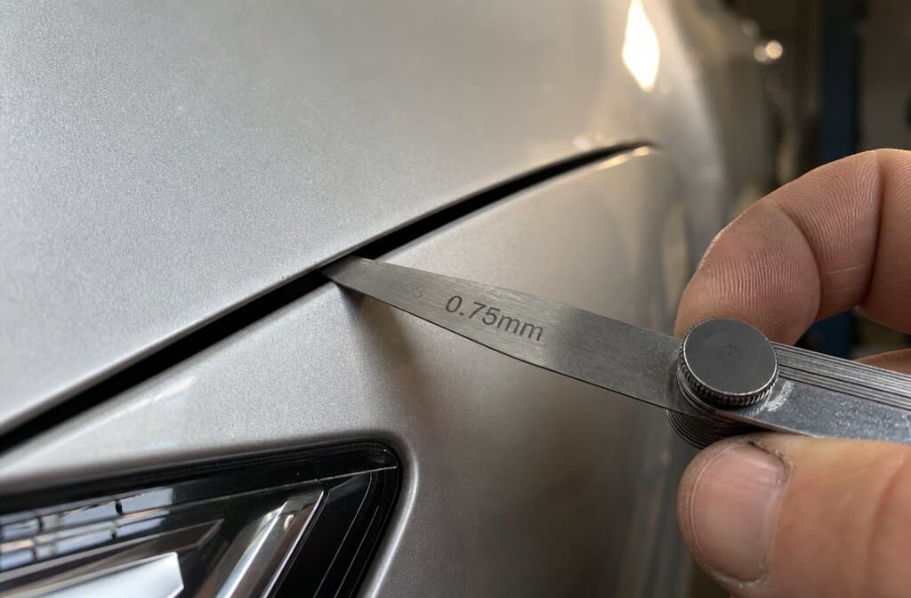Uneven panel gap indicating prior bodywork